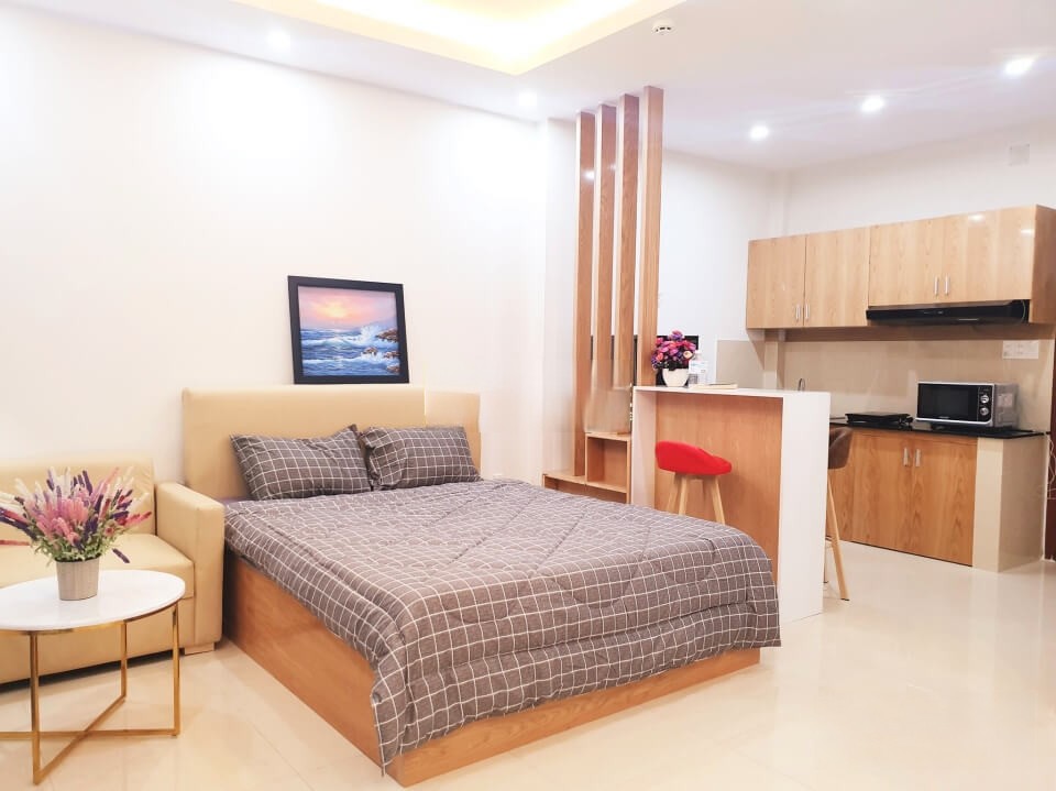 [:en]Bright studio apartment has balcony in Binh Thanh District[:vi]Căn hộ full nội thất và máy giặt riêng tại Bình Thạnh[:]